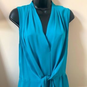 Barely worn 100% silk teal blouse